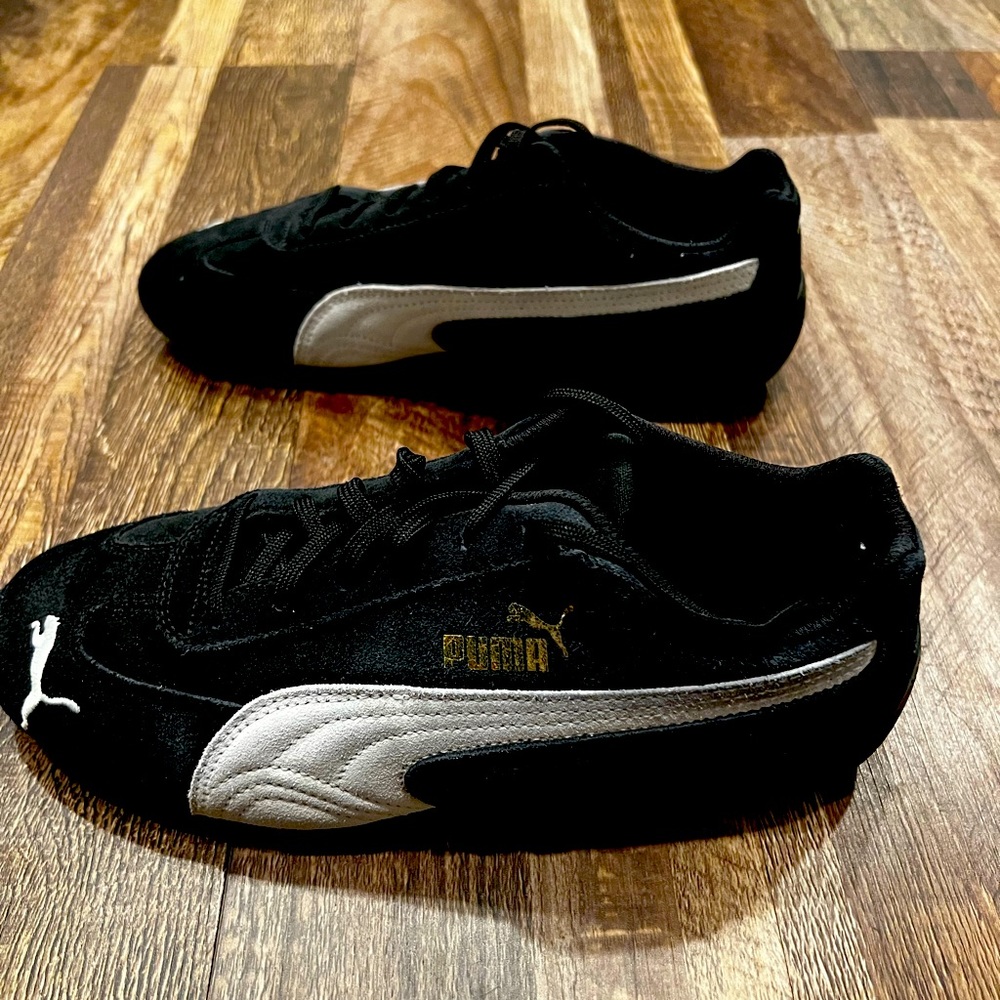 Women’s size 9 Puma shoes.
